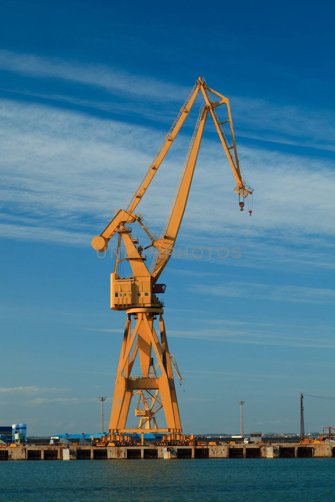 Cranes of the dockyards of Cadiz in a sunny day