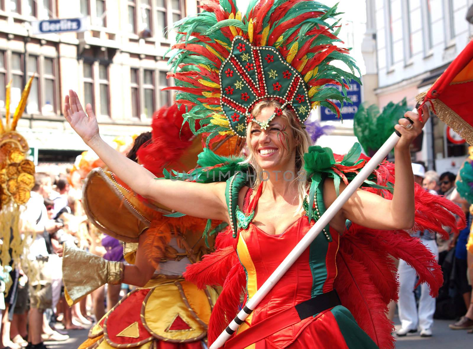 COPENHAGEN - JUNE 11: Participant in the 29th annual Copenhagen Carnival parade of fantastic costumes, samba dancing and Latin styles starts on June 10 - 12, 2011 in Copenhagen, Denmark.