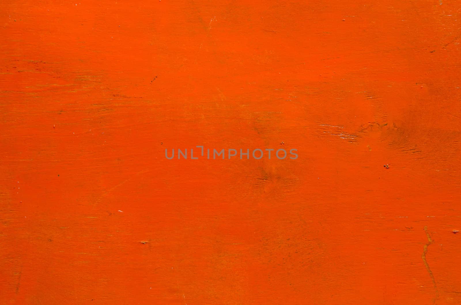 Wooden plank orange color paint background.