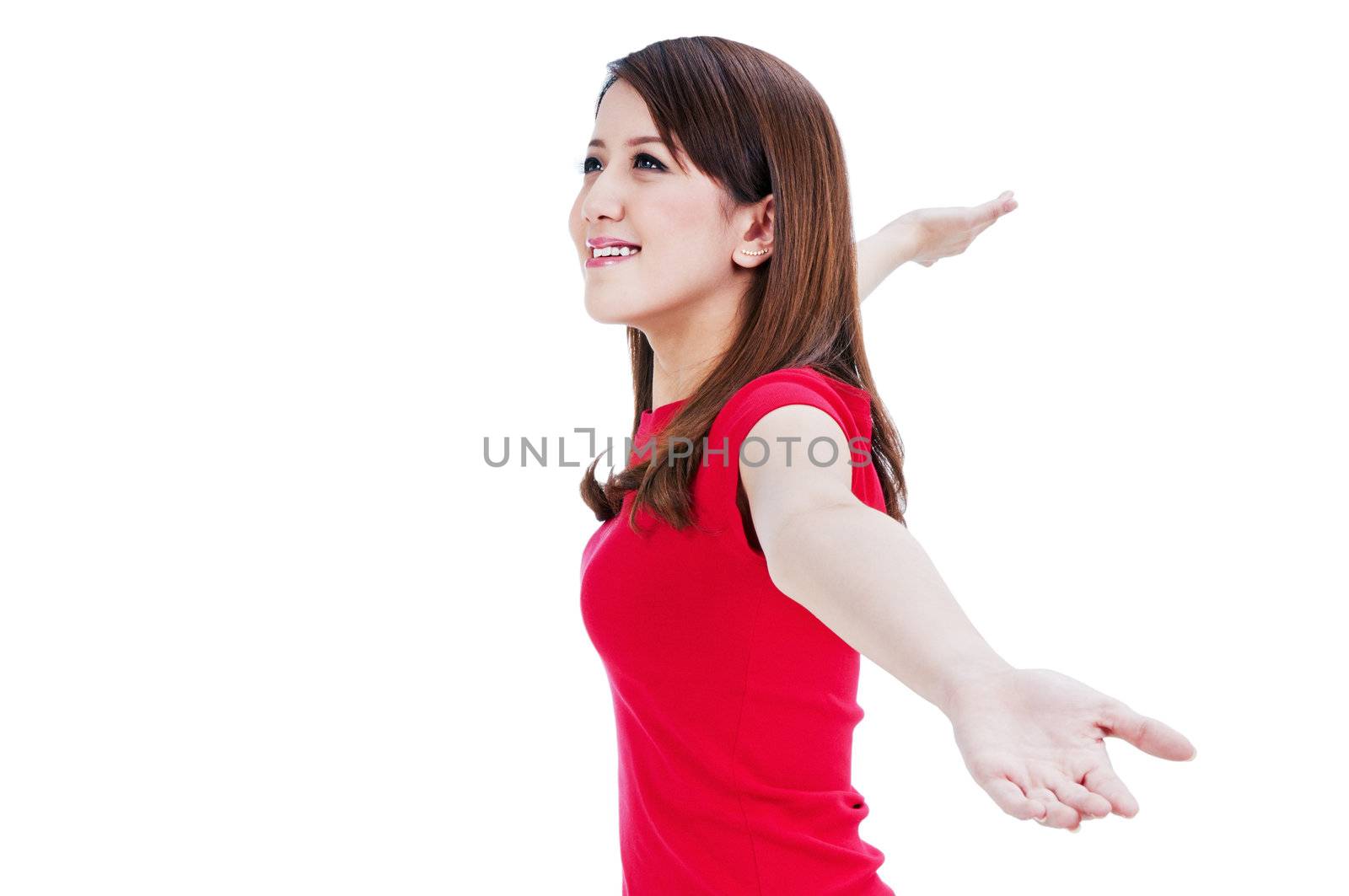 Portrait of a beautiful young woman stretching out her hands, isolated on white background.