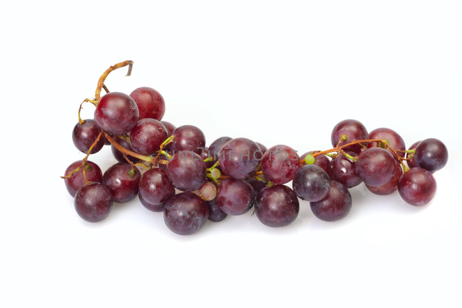 Red ripe grape, photo on the white background