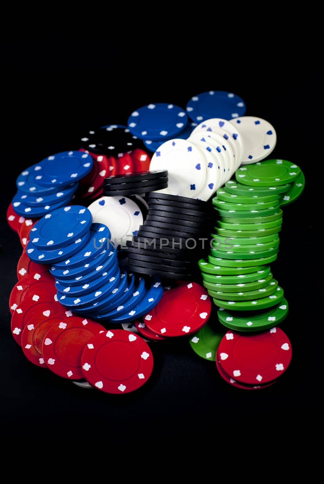 poker chips on black background
