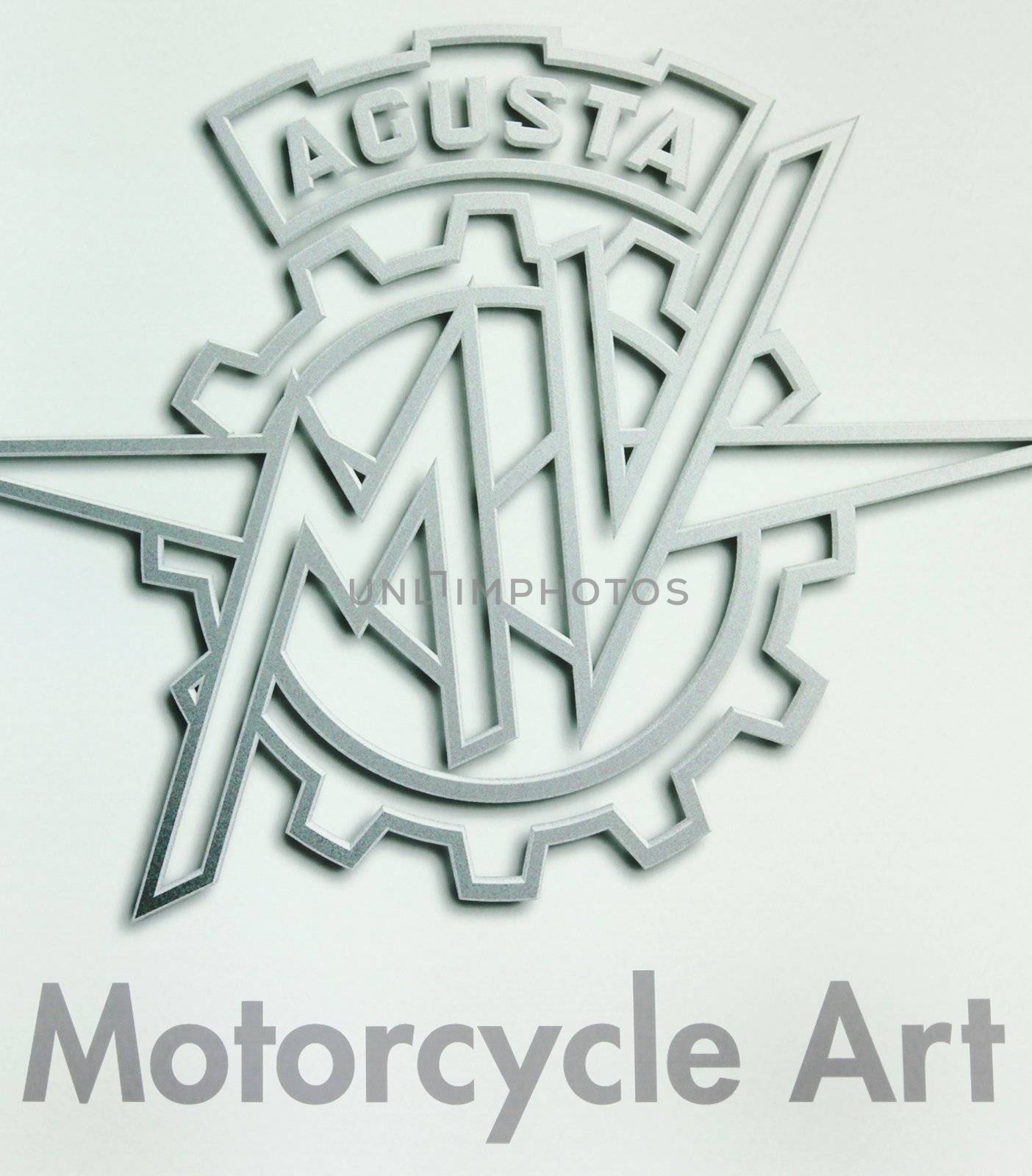 Looking at new motorcycles stands at EICMA, International Motorcycle Exhibition 2010 in Milan, Italy.