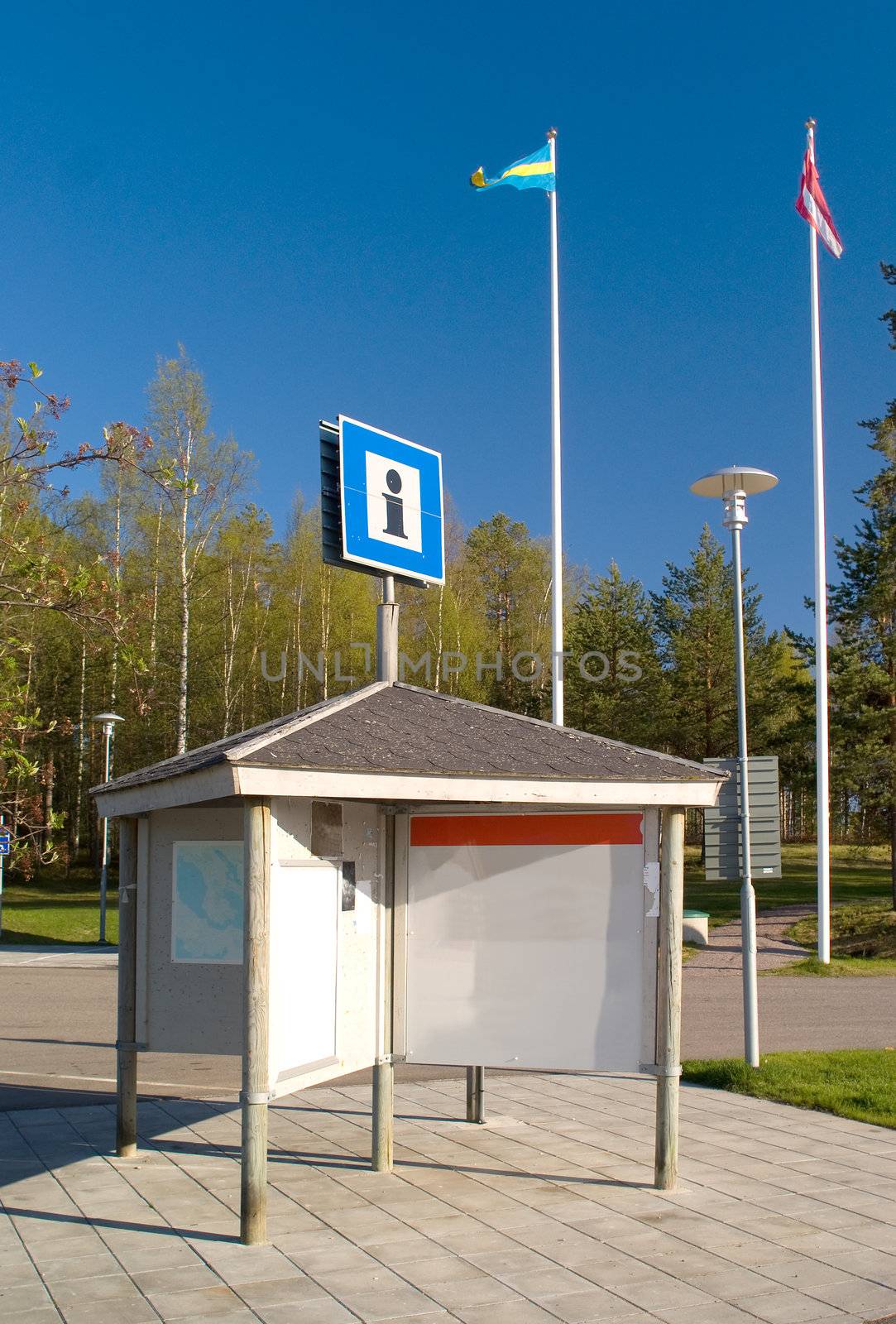 Information board with the flags of Sweden and Denmark