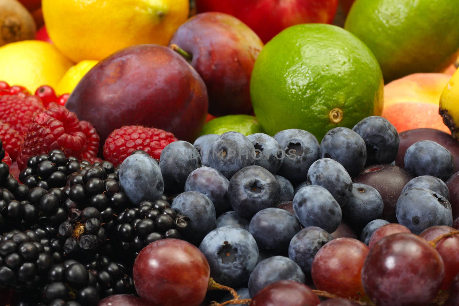 large heap of fresh fruit, abstract background