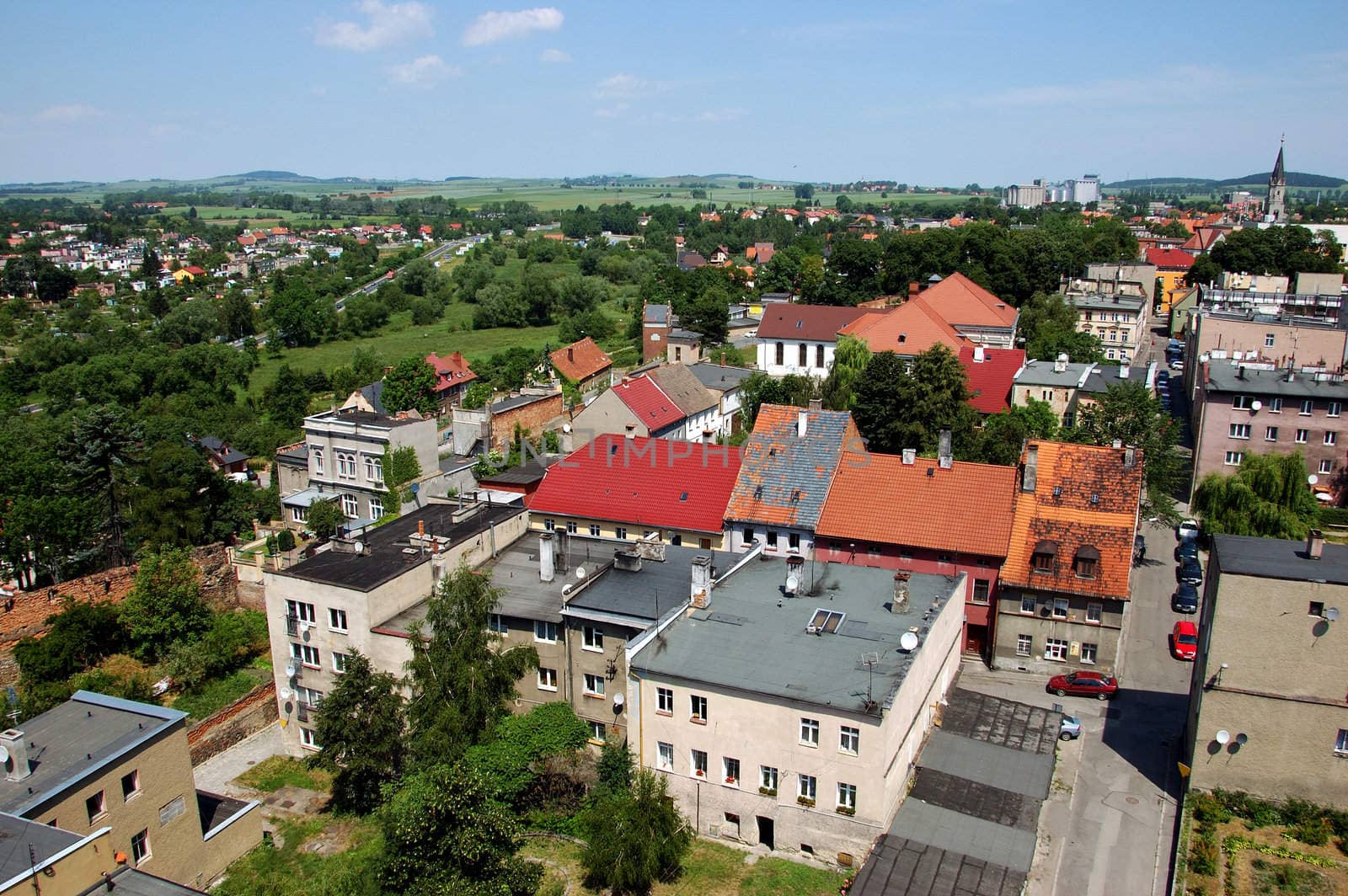 General landscape of Zabkowice Slaskie (previous name Frankenstein) in Lower Silesia, Poland. City buildings and hills viewed from town tower.