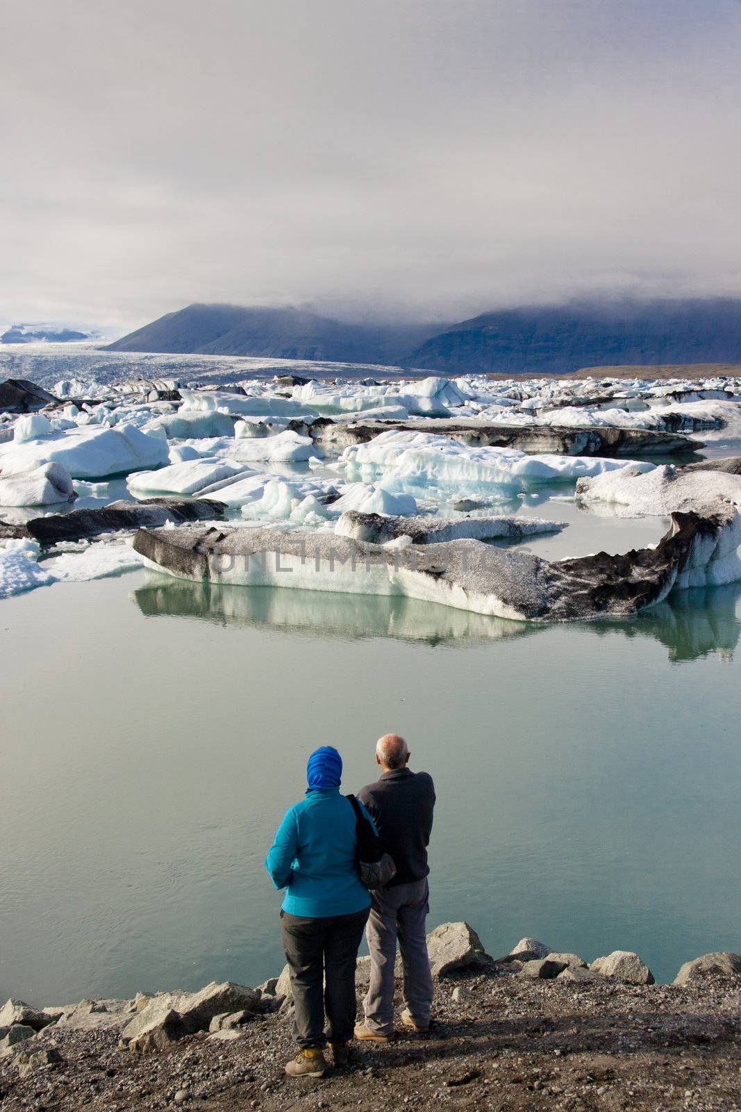 Couple in love. Jokulsarlon ice lagoon in south part of Iceland.