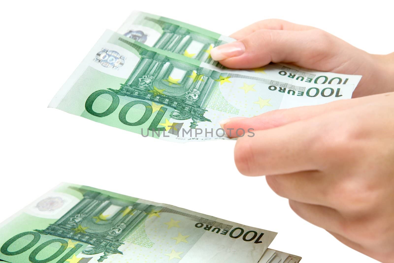Woman stacking Euro bills. Isolated on a white background.