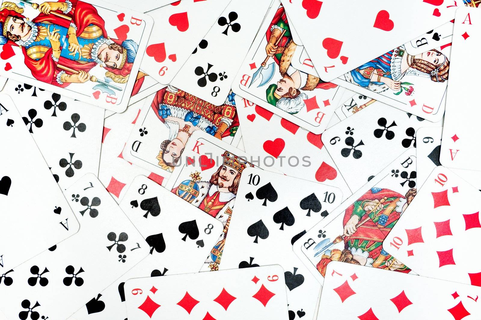 Various playing cards scattered around.