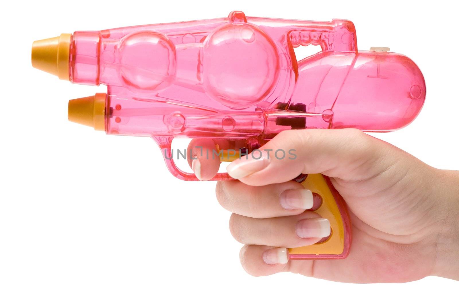 Woman holding a pink water pistol. Isolated on a white background.