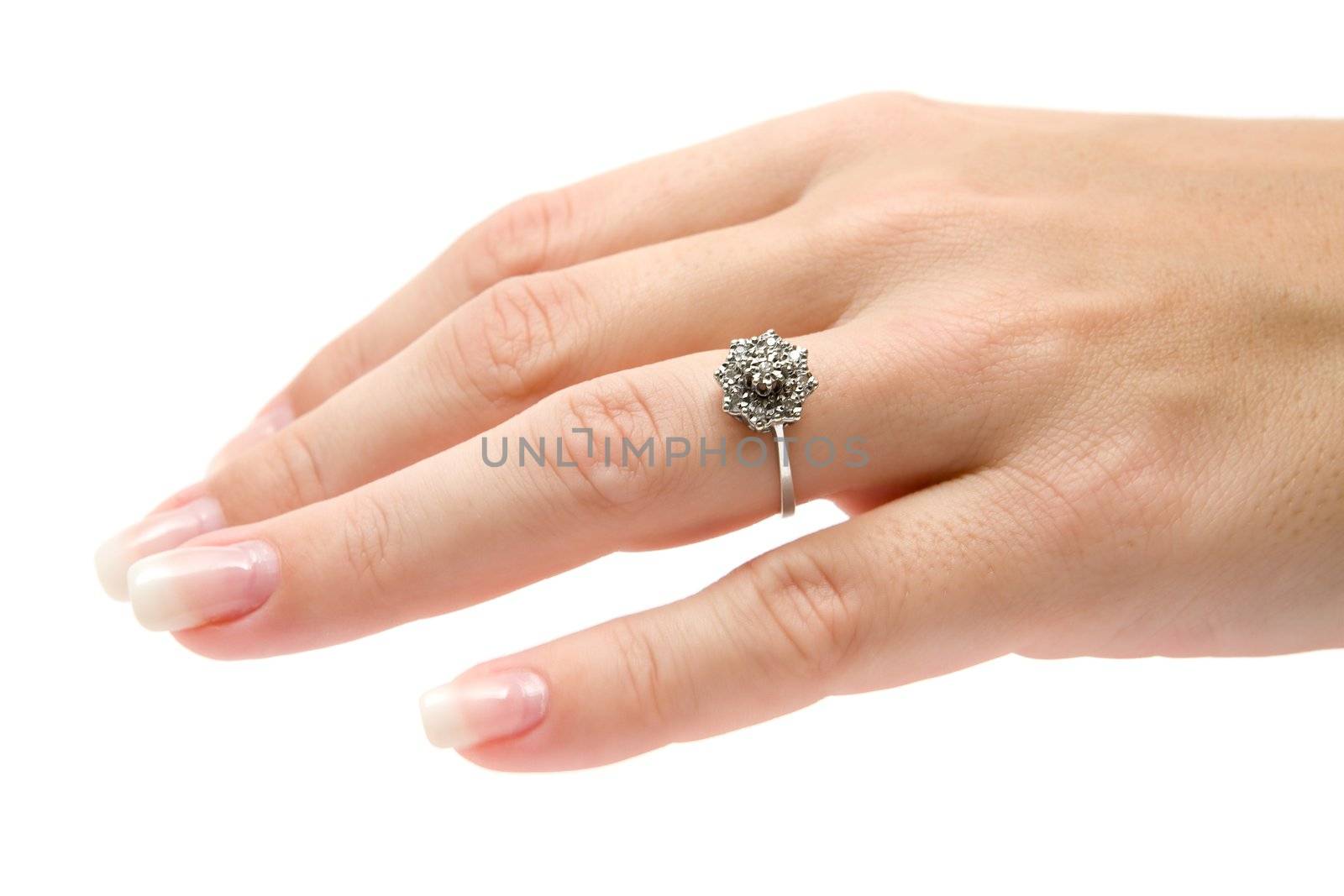 Wearing a precious diamond ring. Isolated on a white background.