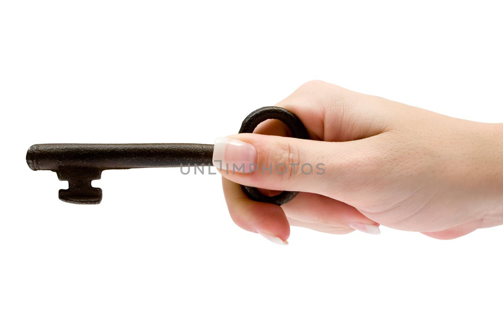 Female hand holding an old and rusty key. Isolated on a white background.