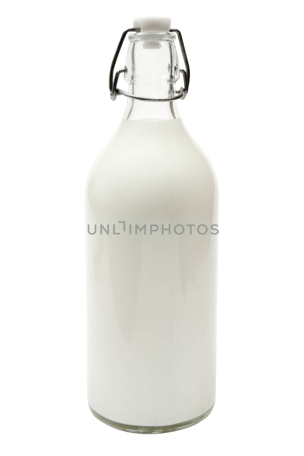 Fresh milk in a glass bottle. Isolated on a white background.
