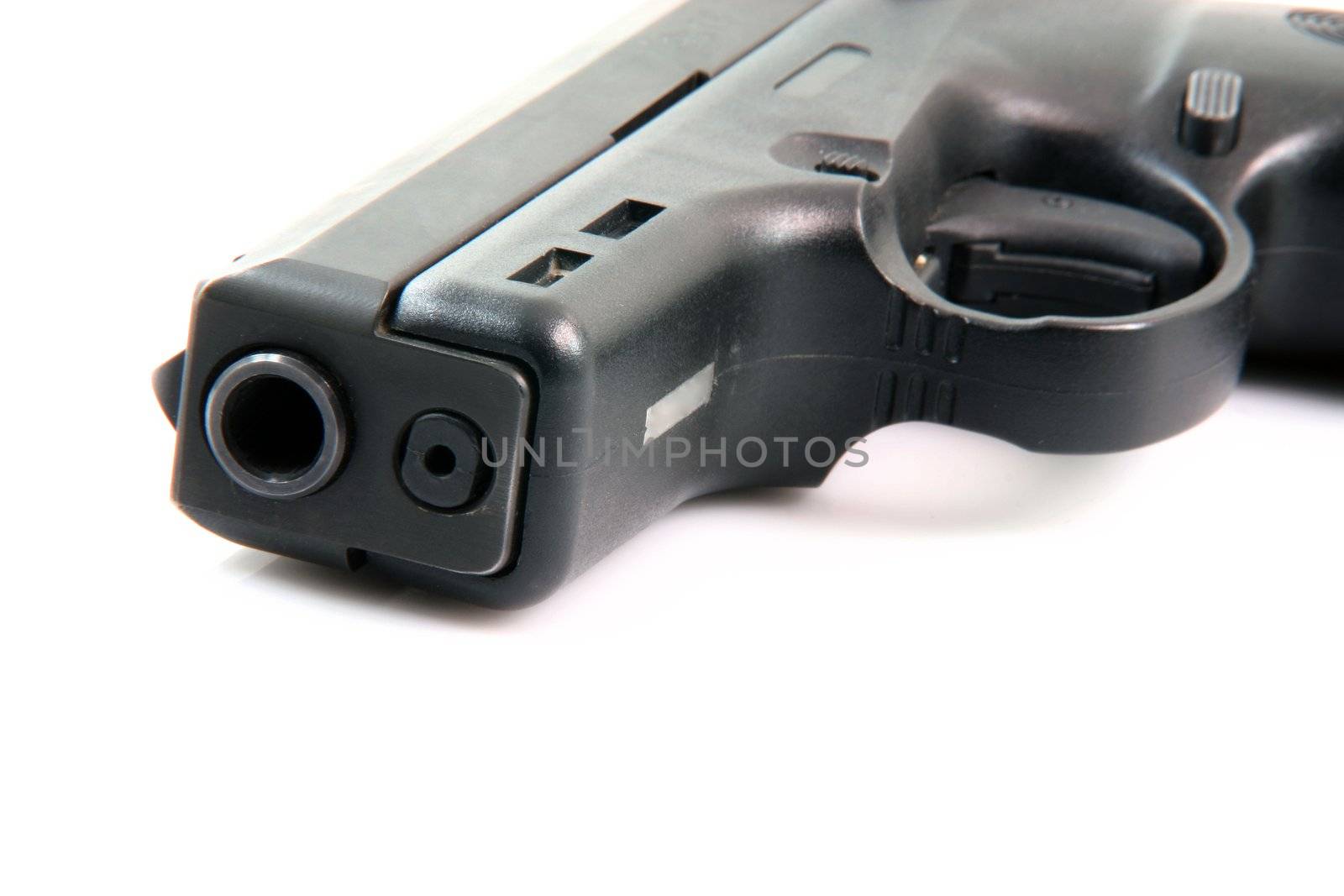 detail from handgun isolated on white background