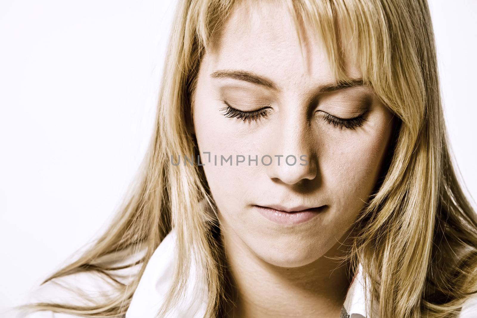 Studio portrait of a long blond girl looking relaxed by DNFStyle