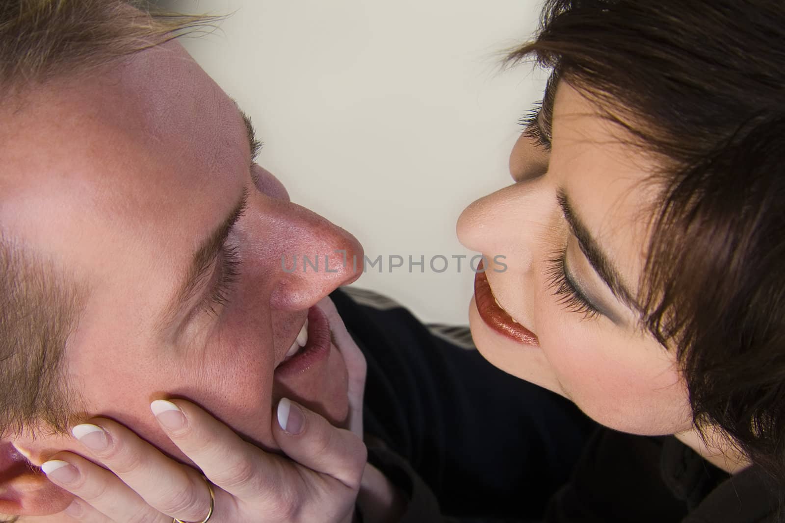 Woman stroking her man's face by DNFStyle
