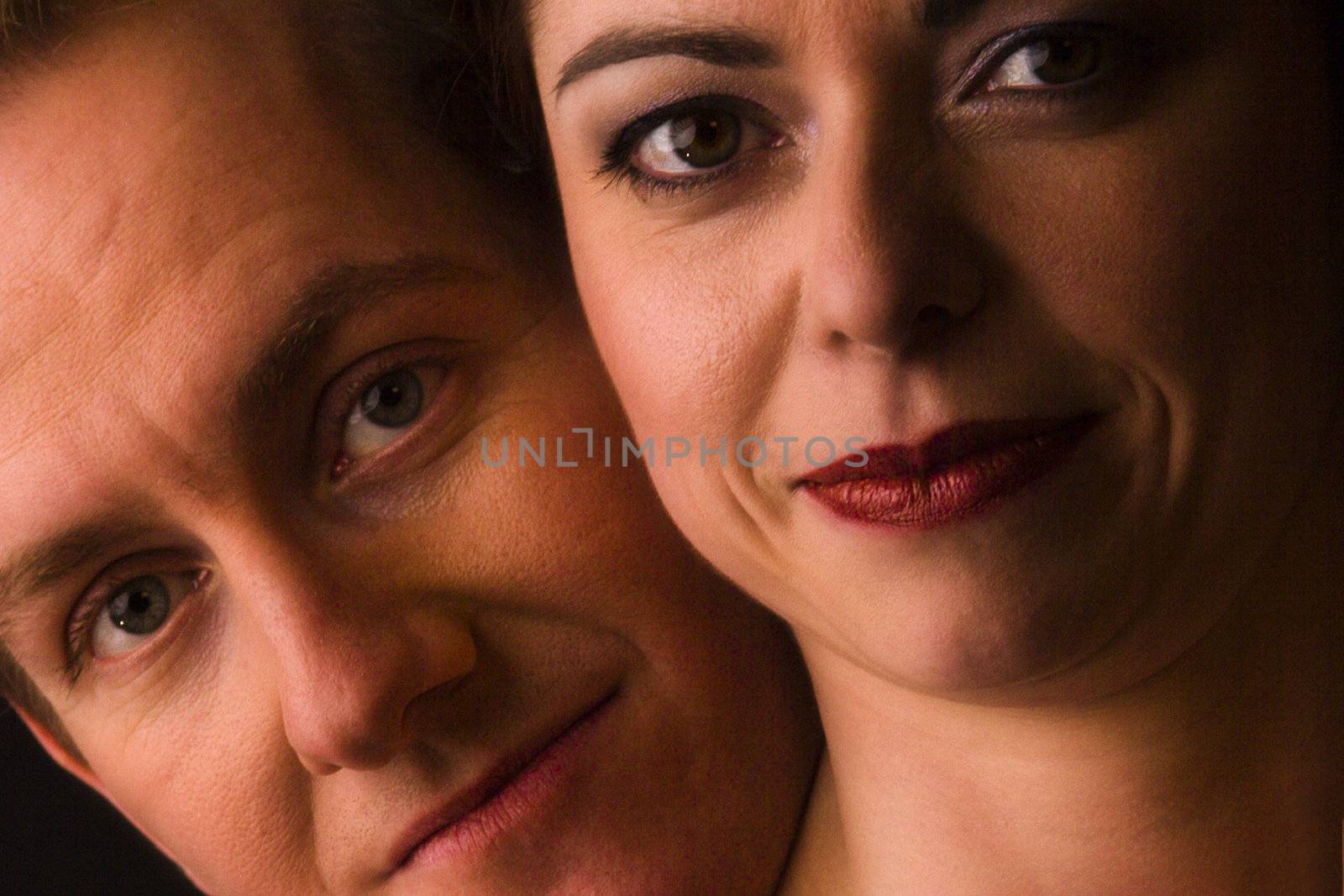 Married lovers portraits taken in the photo studio close up