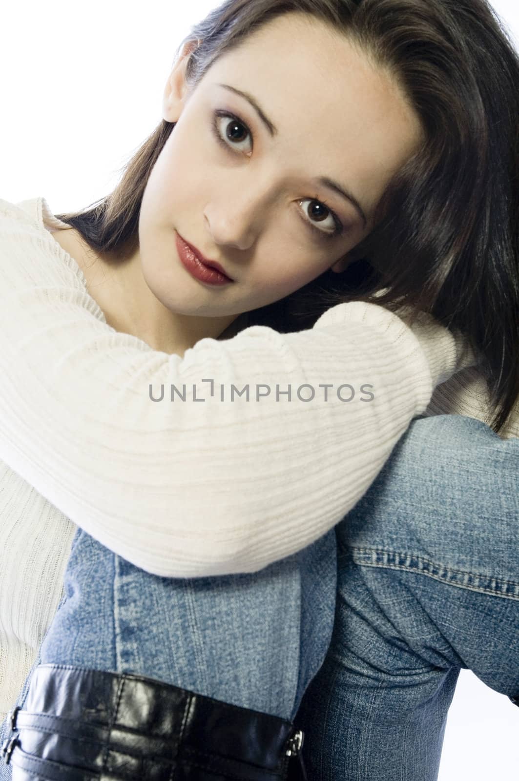 Studio portrait of pretty brunette looking tired