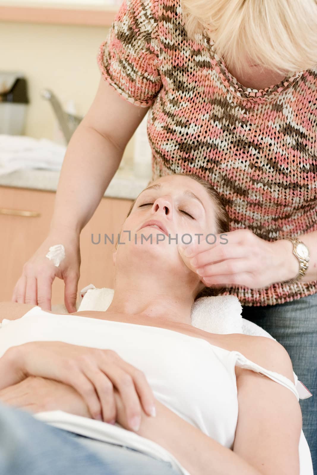 Bride being groomed and prepared for her wedding