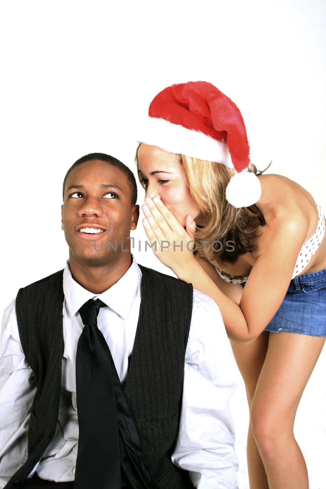 Woman whispering in man's ear