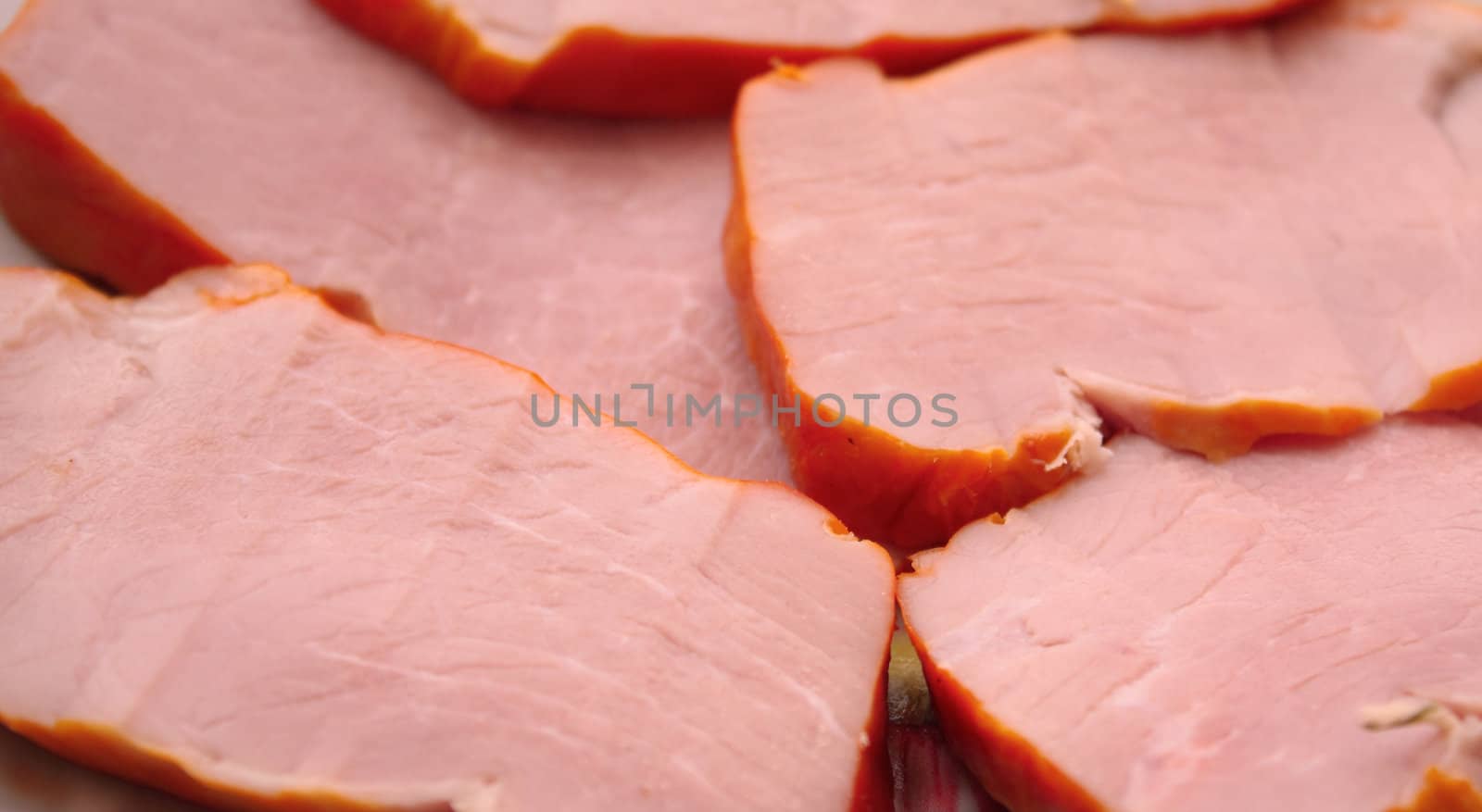 Close up of the pork meat slices. Background.