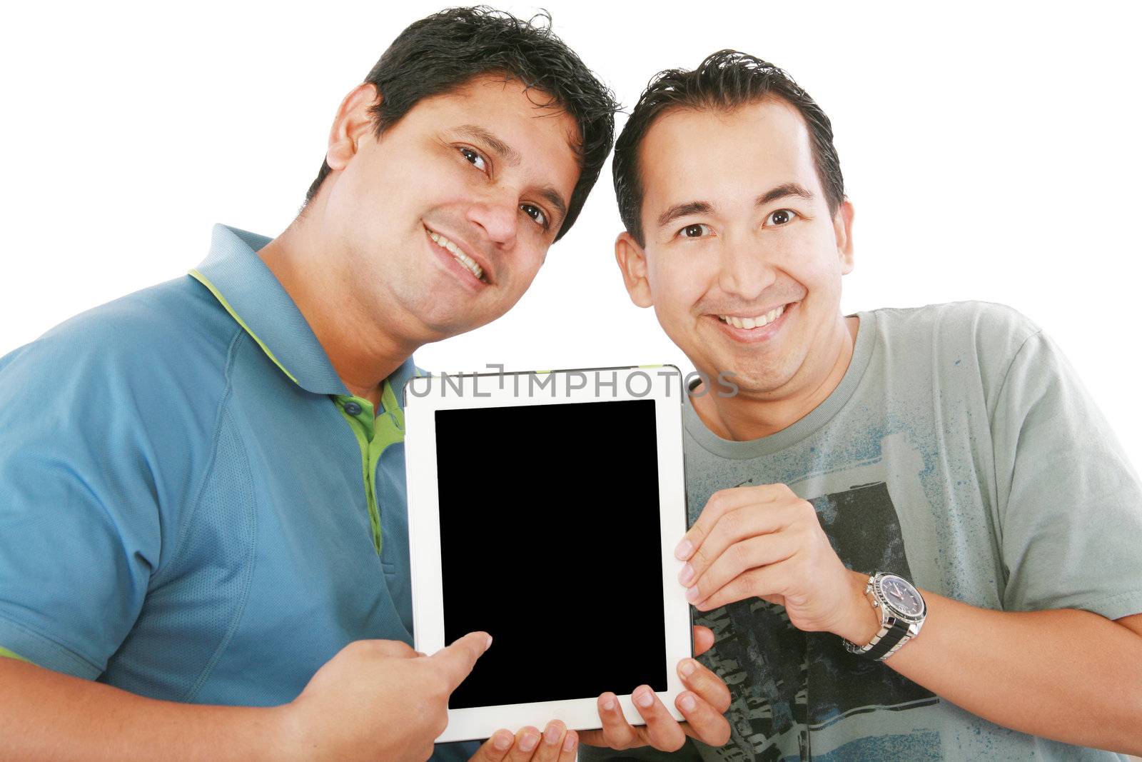Two young men or businessmen showing a tablet PC computer and sm by dacasdo
