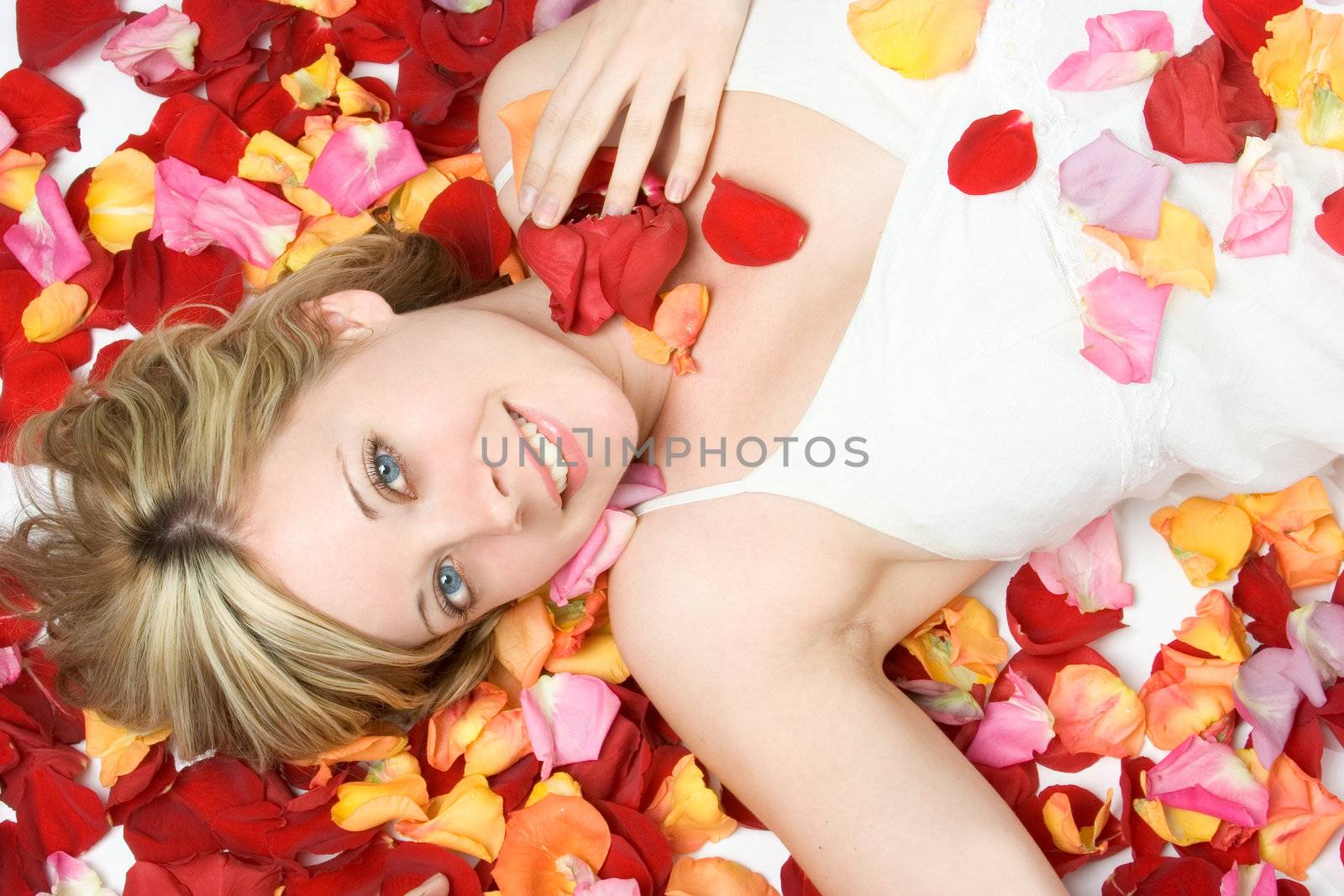 Smiling beautiful flower petals woman