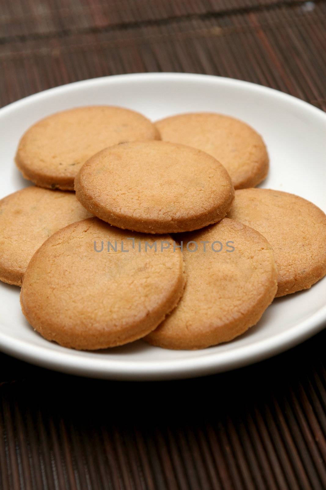 Biscuits on a plate by haiderazim