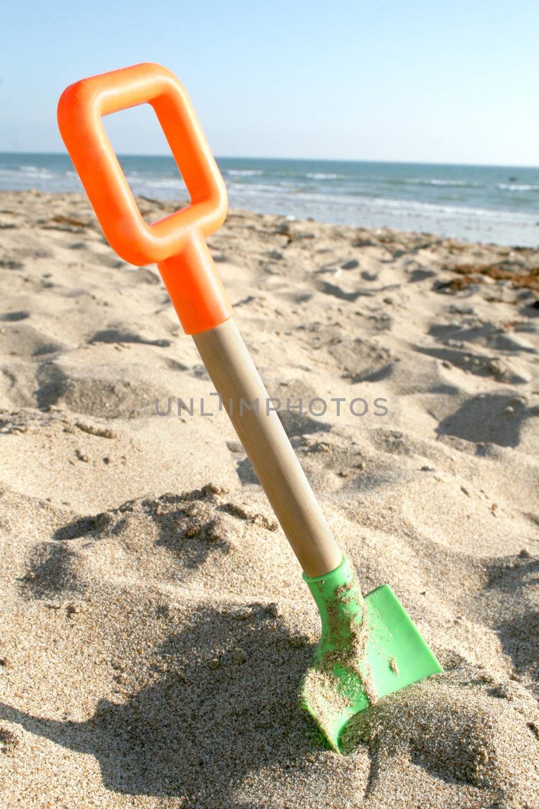 Beach Shovel on sand by haiderazim