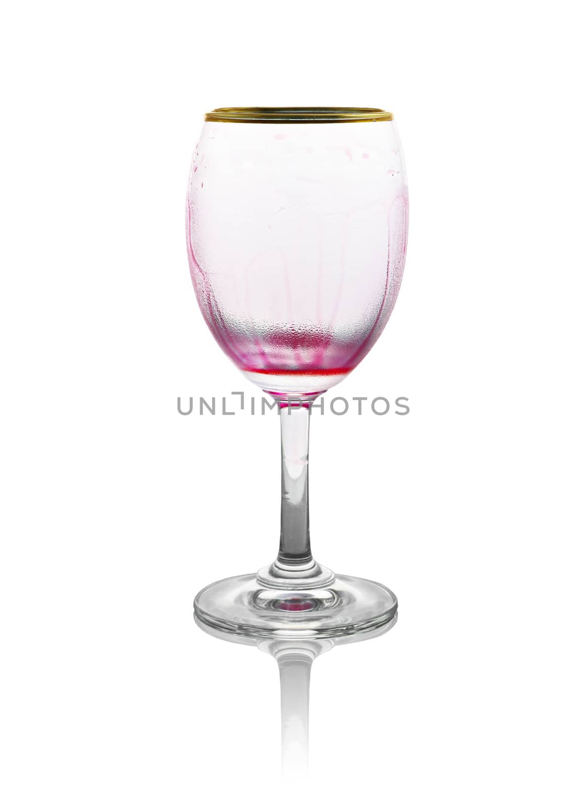 Red wine glass is empty on white background