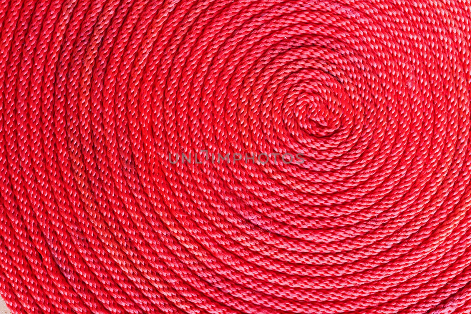 Spiral coil of braided red rope