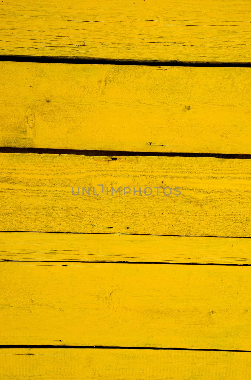 Wall made of yellow wooden planks. by sauletas