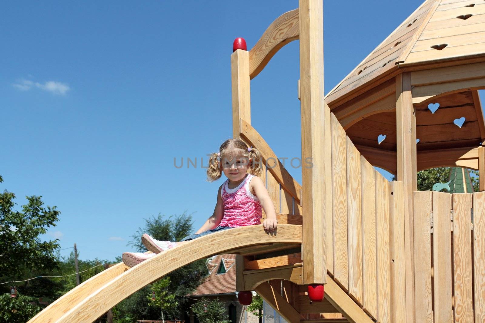 beauty little girl on playground