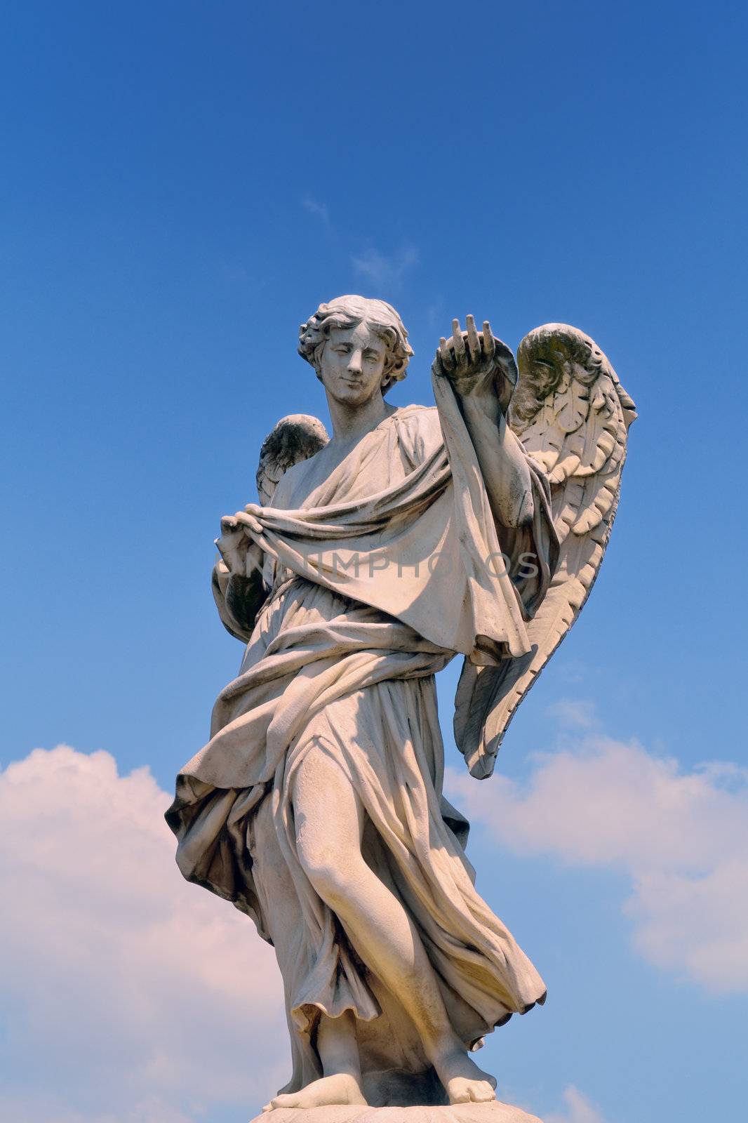 Ancient marble sculpture of angel on the bridge in Rome, Italy