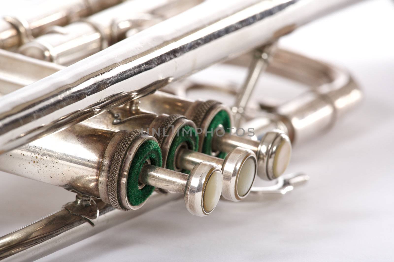 Old trumpet photo on the white background