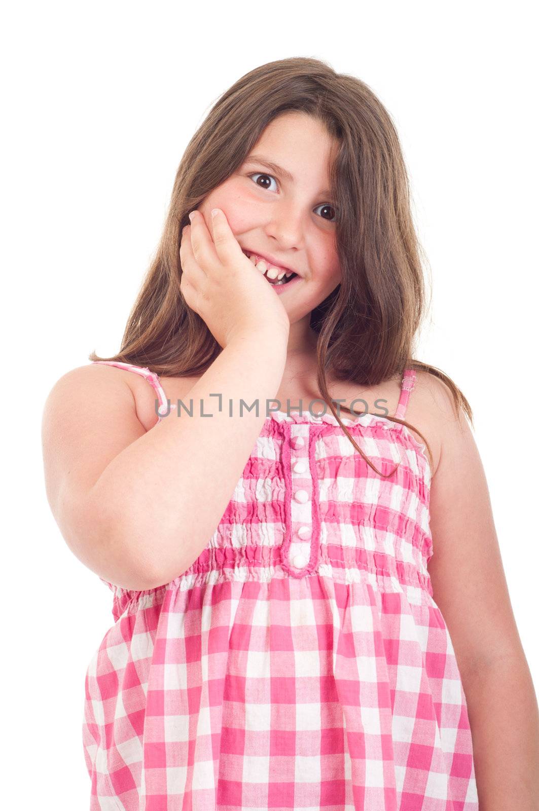 surprised and adorable little girl portrait smiling in a pink top (isolated on white background) 
