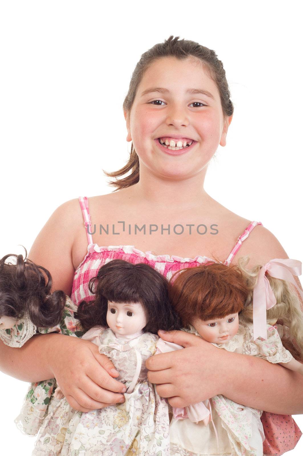 joyful little girl with her favorite dolls (isolated on white background) 