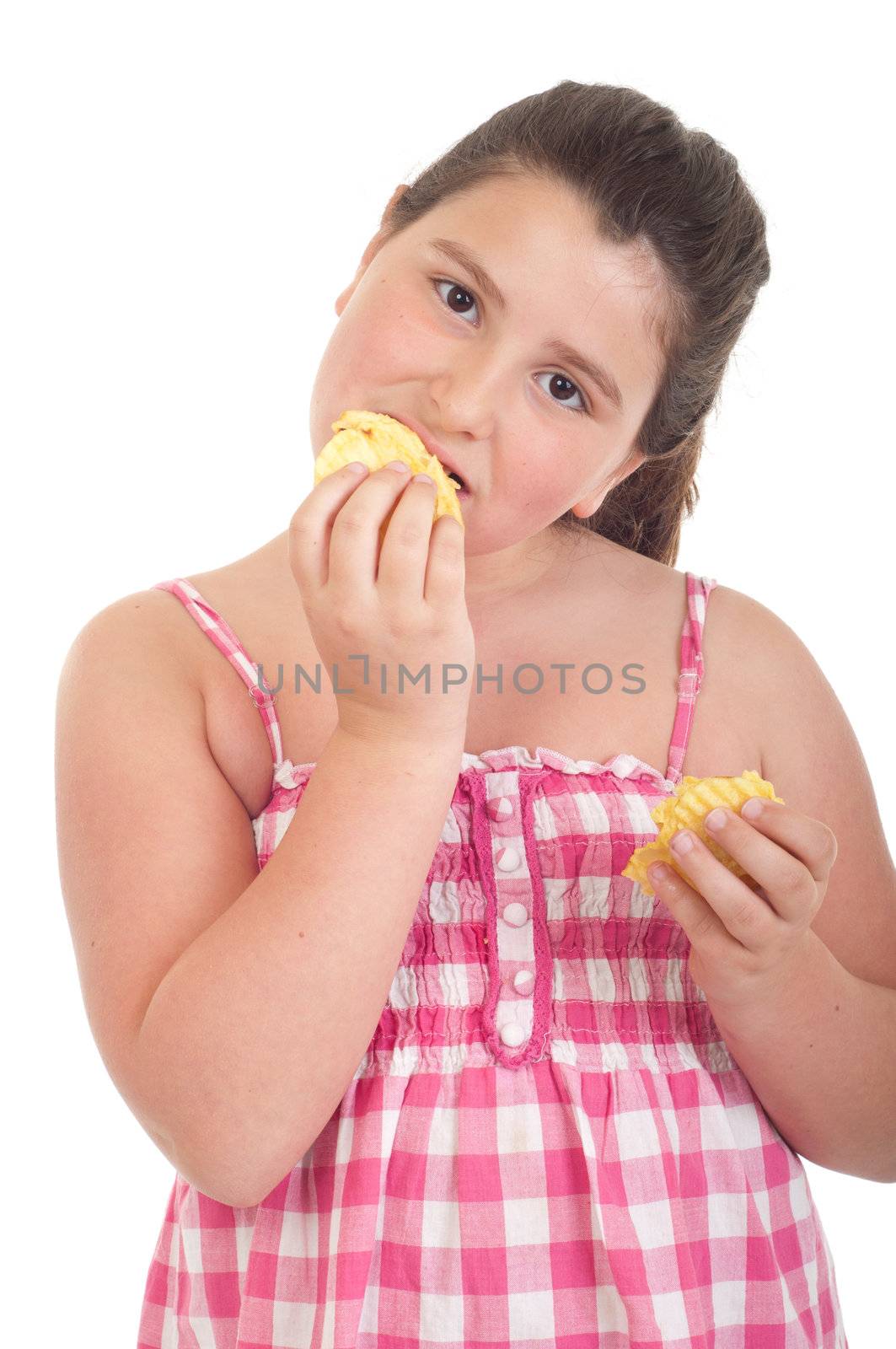 cute little girl eating chips (isolated on white background)