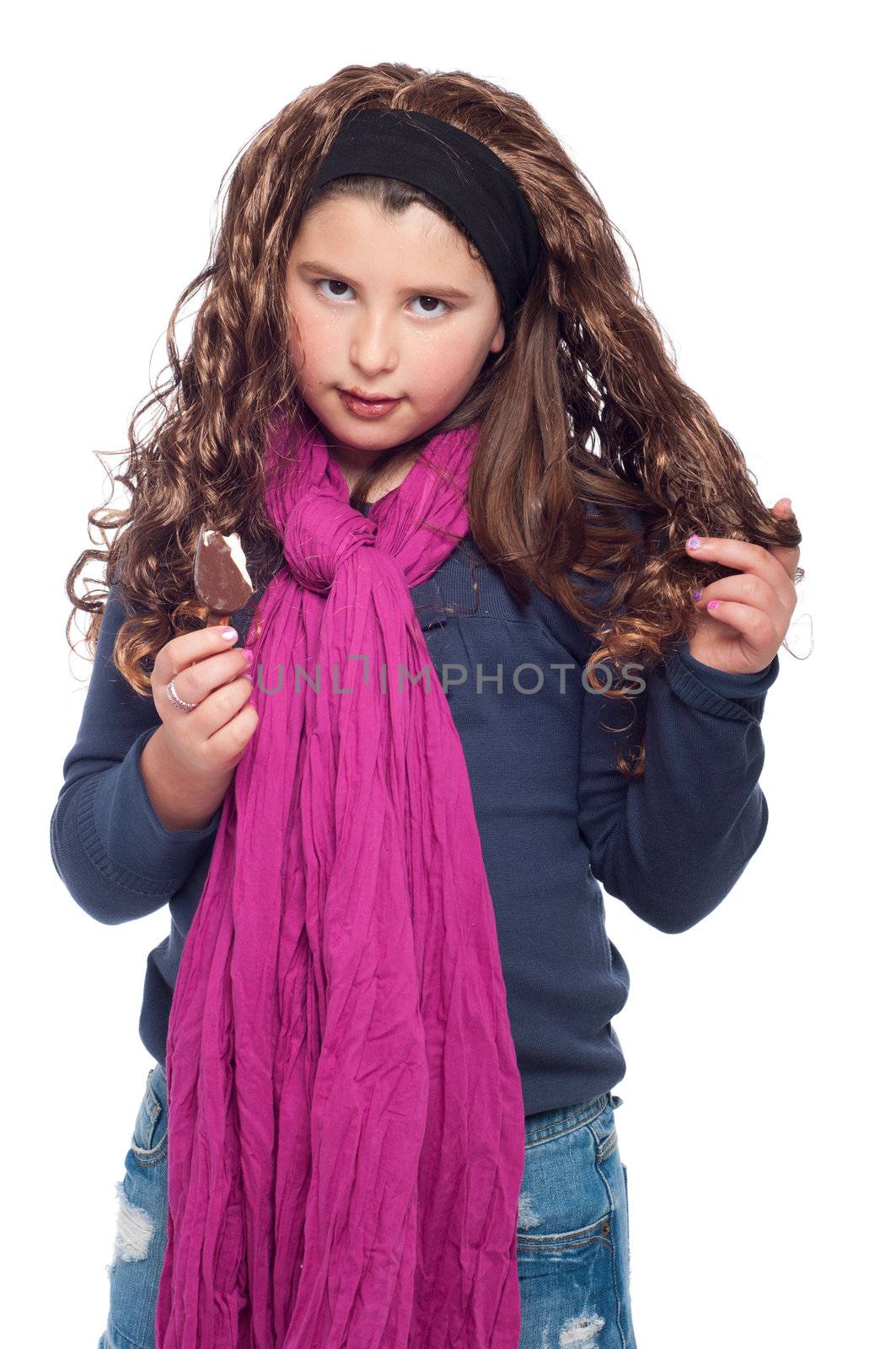 adorable little girl portrait dressed as teenager with long wig and glitter, eating an ice cream (isolated on white background)