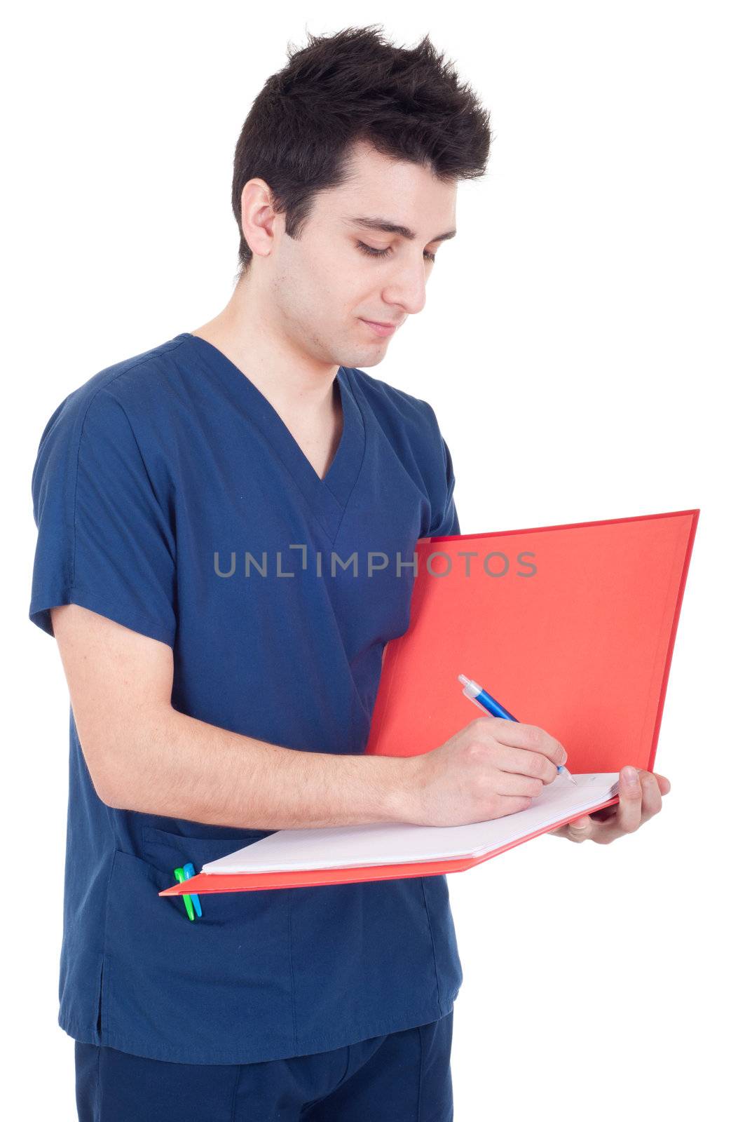 handsome male doctor making a note isolated on white background