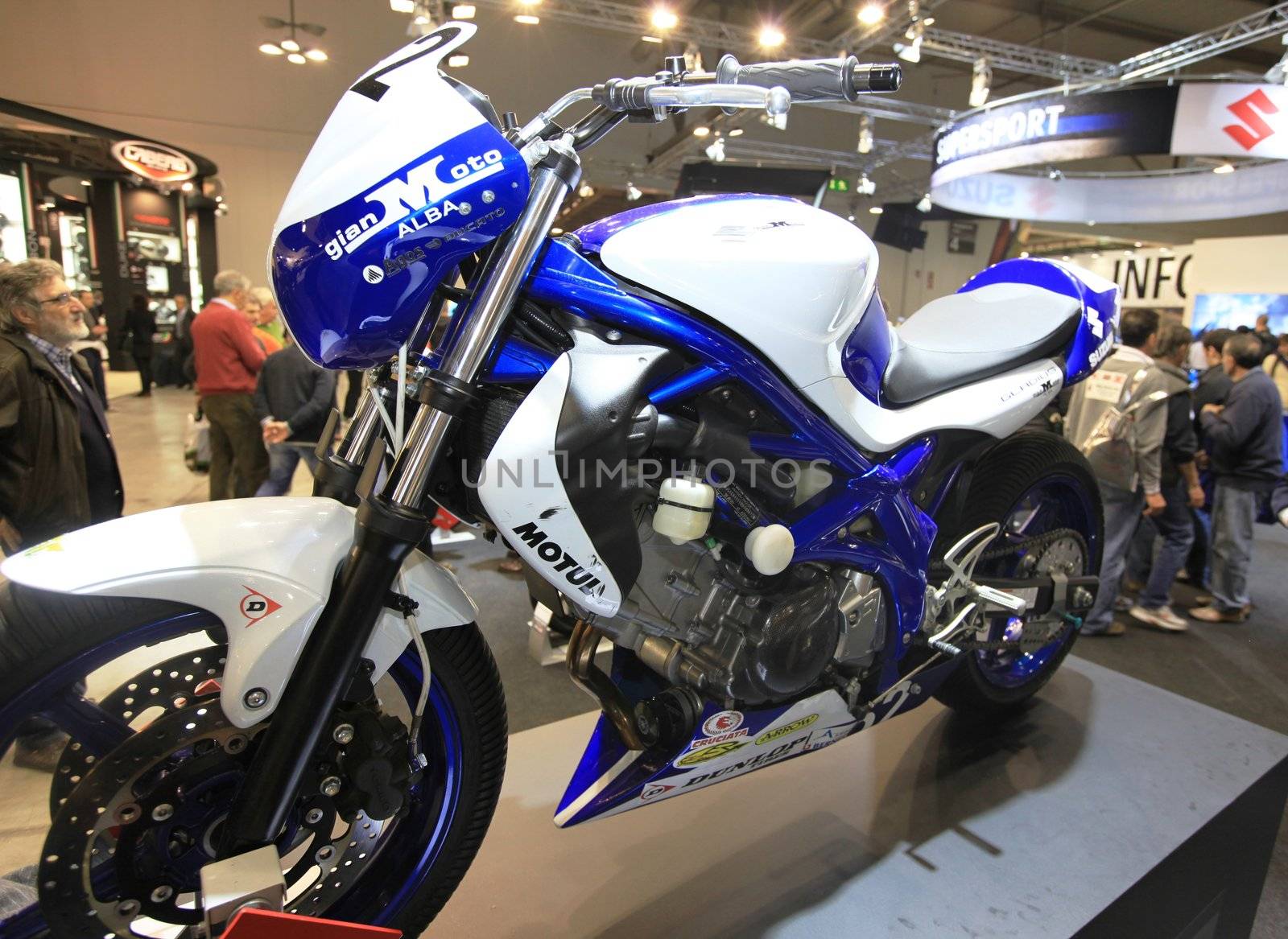 Visiting motorcycels stands during EICMA 2011, International Motorcycle Exhibition in Milan, Italy