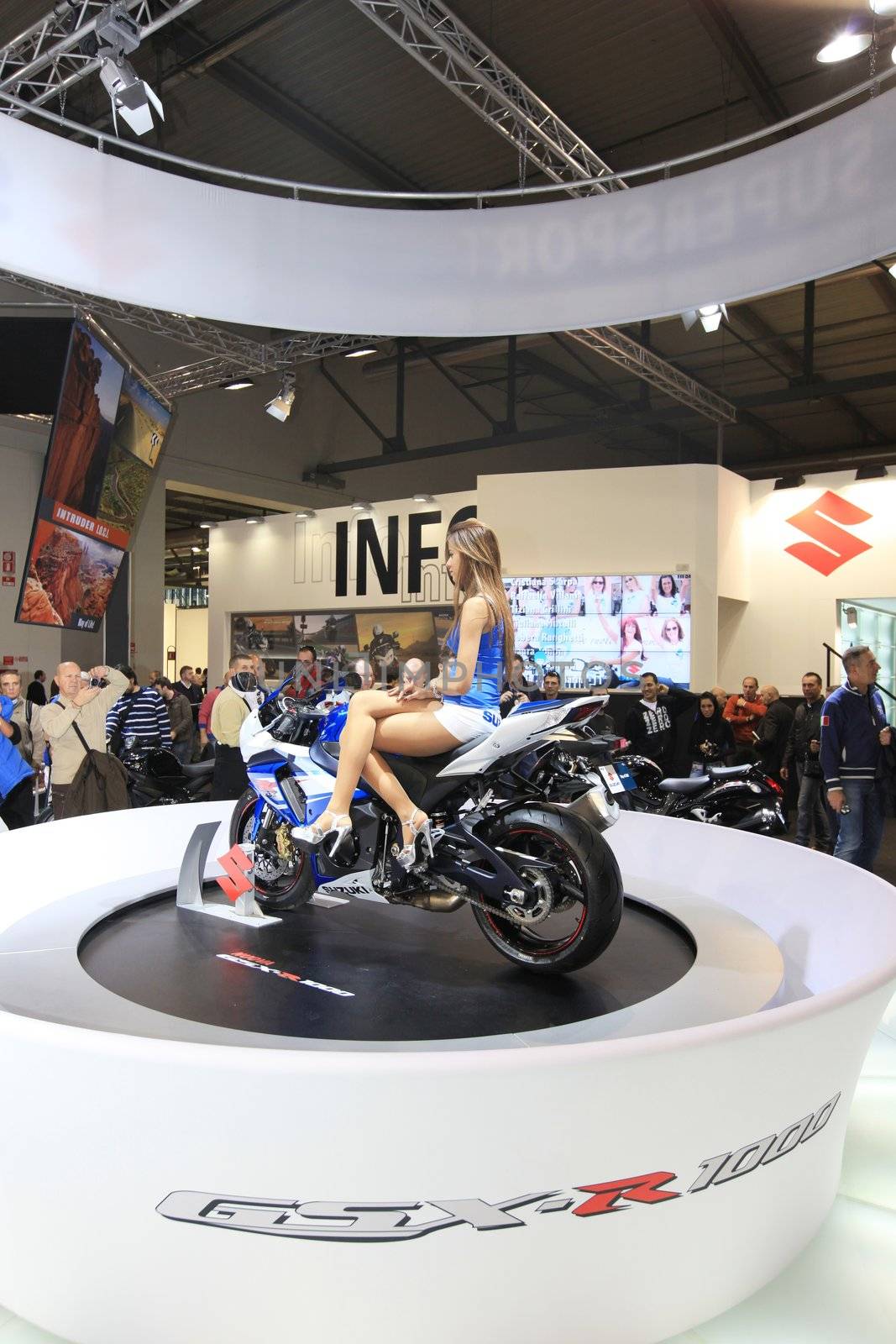 Visiting motorcycels stands during EICMA 2011, International Motorcycle Exhibition in Milan, Italy