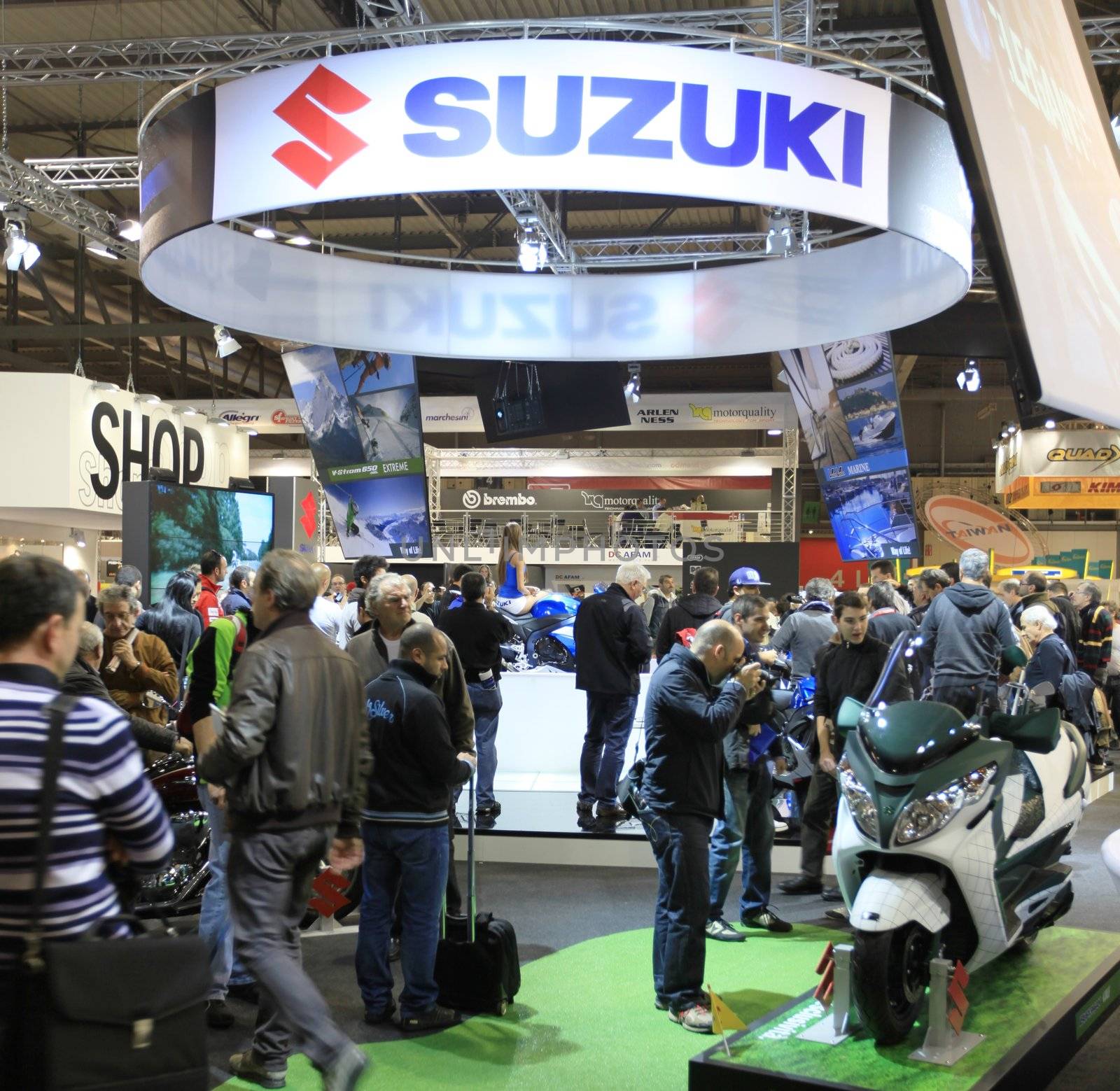 Visiting motorcycels stands during EICMA 2011, International Motorcycle Exhibition in Milan, Italy