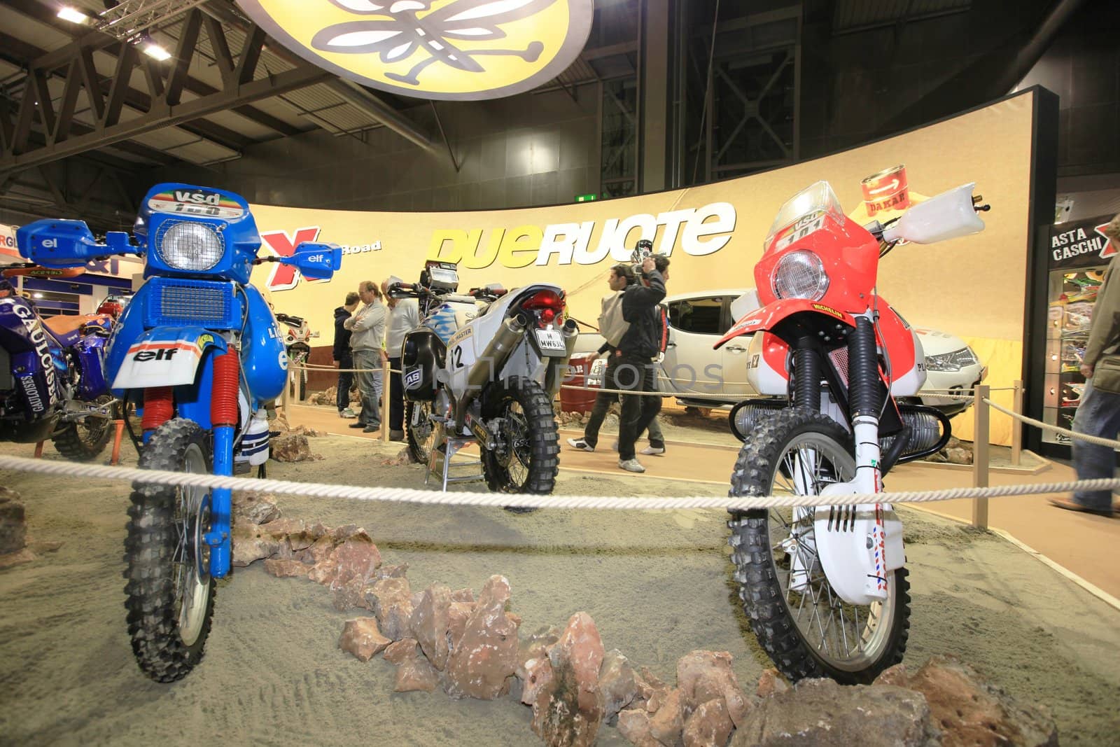 Visiting scooters and motorcycels stands during EICMA 2011, International Motorcycle Exhibition in Milan, Italy