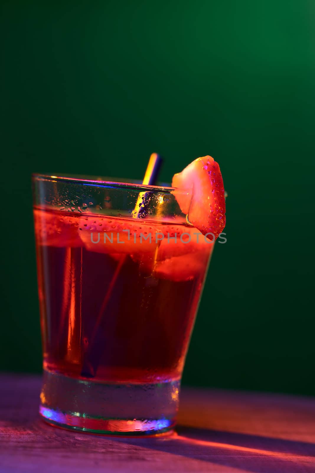 Strawberry Drink in Colorful Lights by ildi