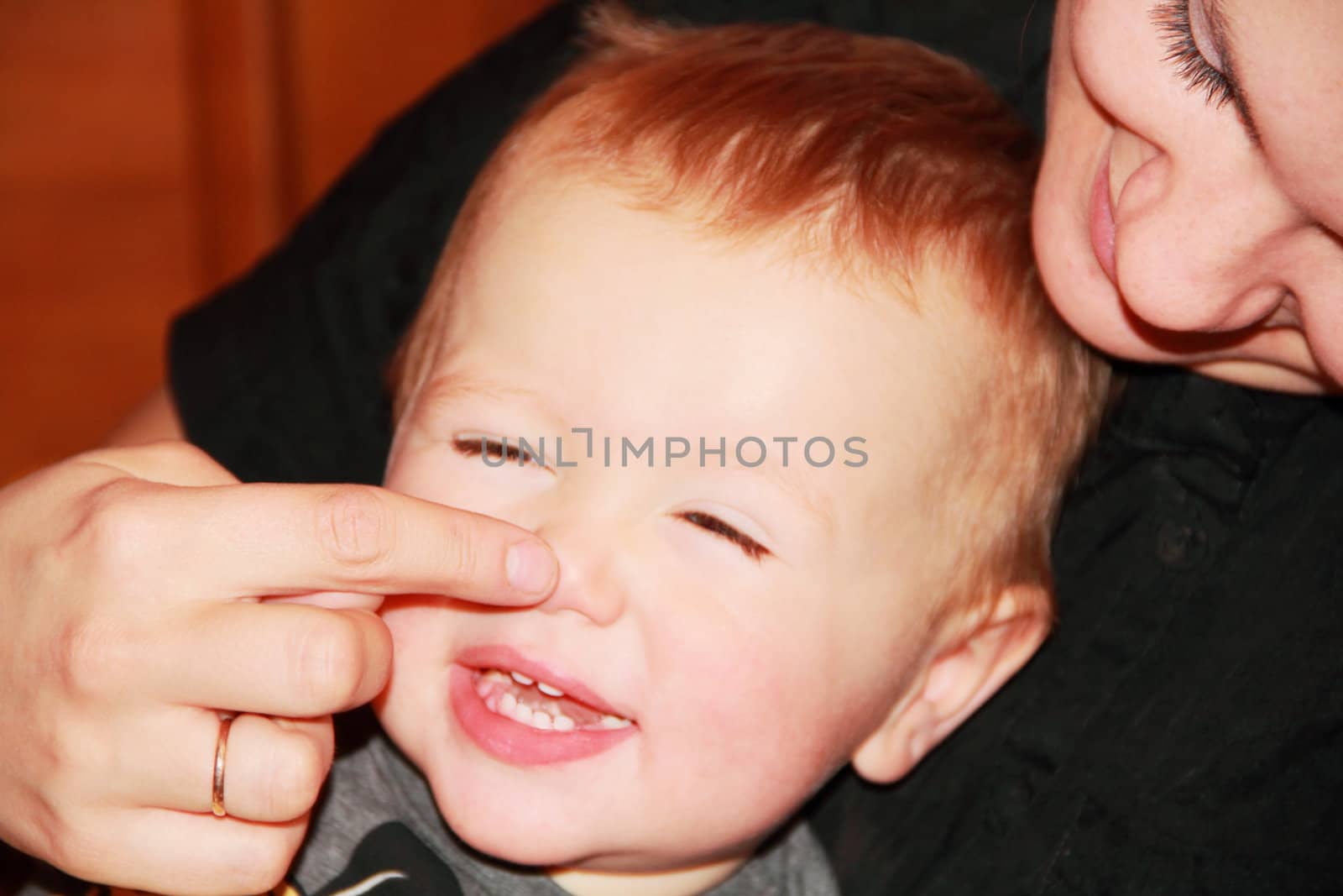 Cute baby 1 year with his mother