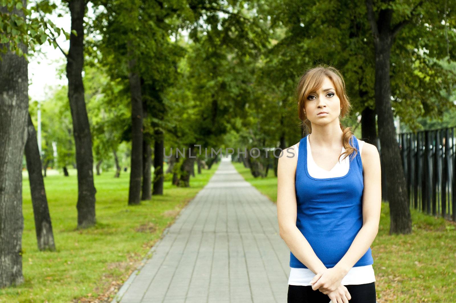 portrait Young woman in summer park by adam121