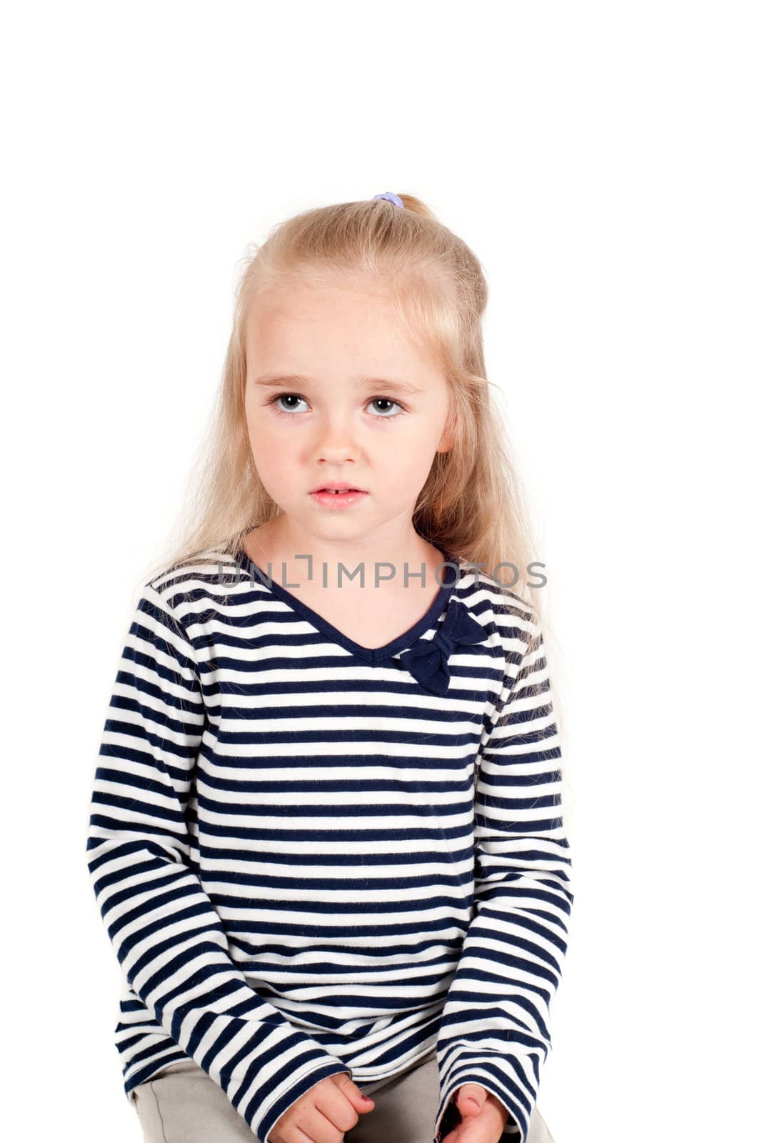 Shot of little cute girl with long hair in studio