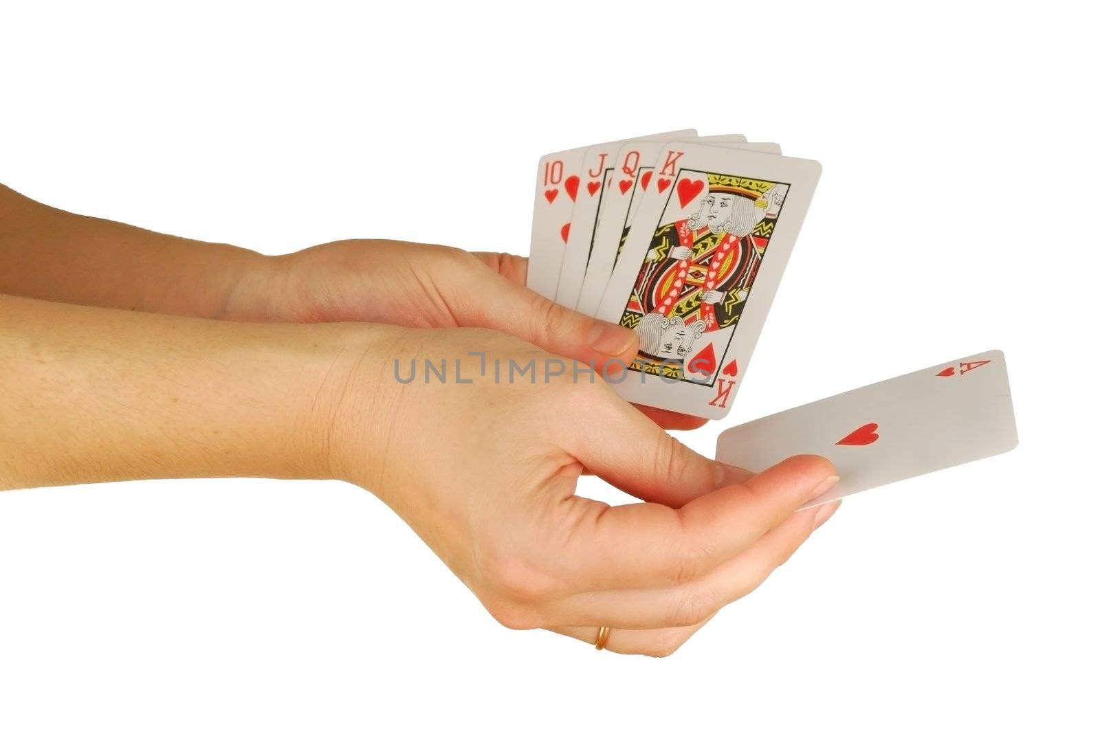 a womanish hand holds a playing cards