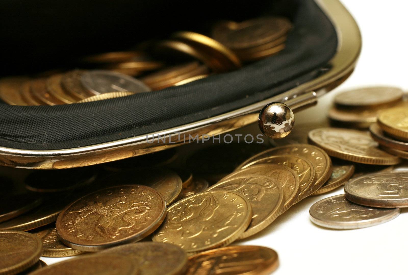 Open leather pouch with Russian coins